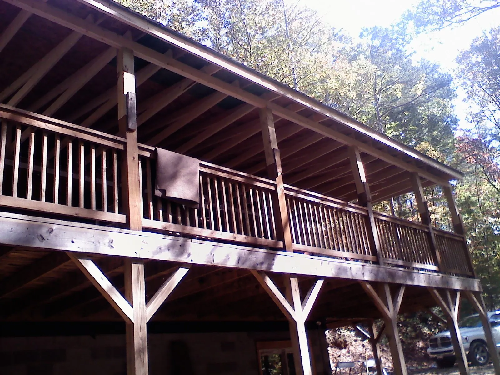 Timber framing under a new elevated porch and deck in Evansville